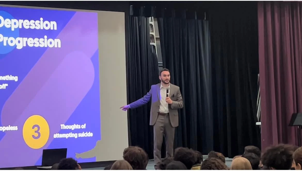 Evan discussing depression progression on stage